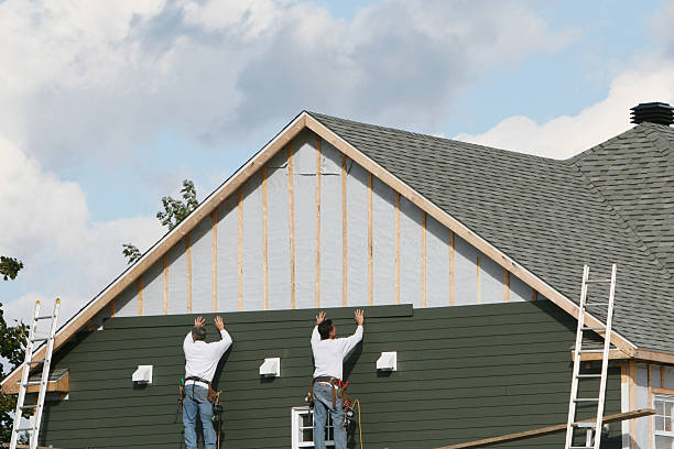 Professional Siding technician working in Holloway, OH